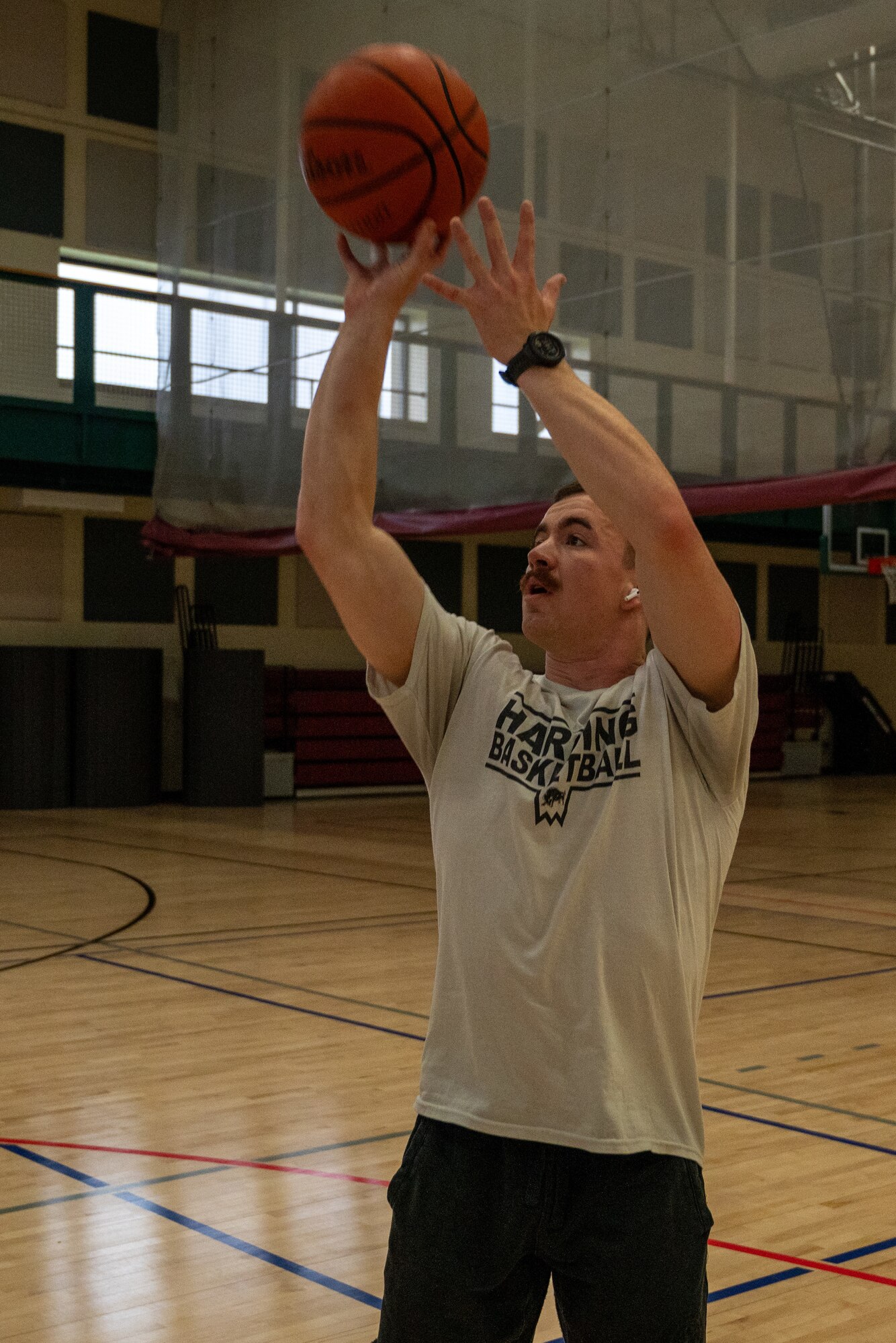 A U.S. Air Force Airman shoots a basketball in the Losano Fitness Center at Laughlin Air Force Base, Texas, April 25, 2024. Intramural sports are an excellent option for Airmen fitness, offering fun and competition while burning calories. (U.S. Air Force photo by Staff Sgt. Nicholas Larsen)