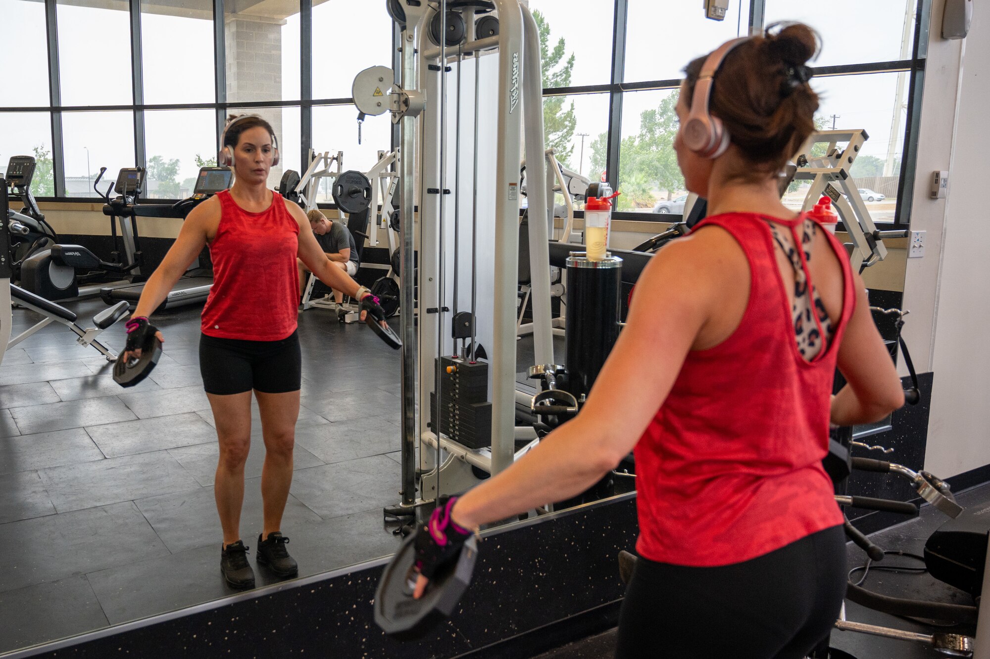 A U.S. Air Force Airman lifts weights in the Losano Fitness Center at Laughlin Air Force Base, Texas, April 25, 2024. May is National Physical Fitness and Sports Month promoting healthy living and fitness for people around the U.S. (U.S. Air Force photo by Staff Sgt. Nicholas Larsen)