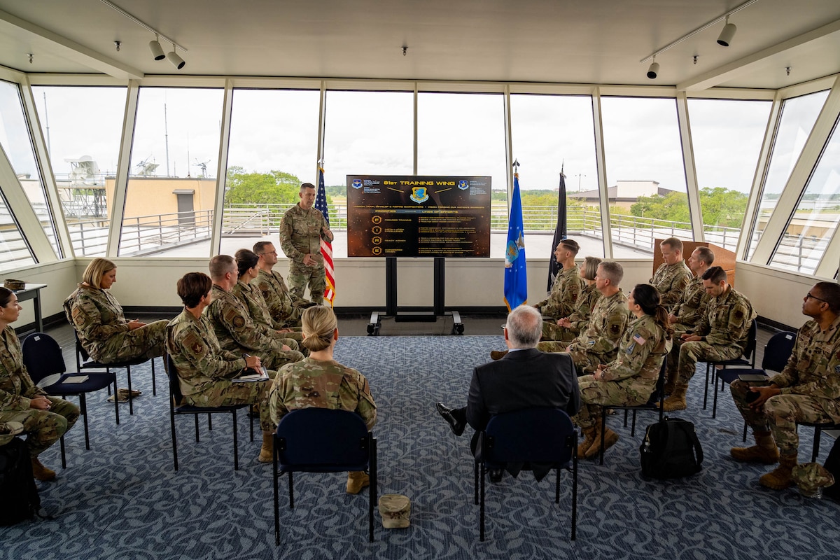 U.S. Air Force Col. Billy Pope, Jr., 81st Training Wing commander, gives an 81st TRW mission brief to Secretary of the Air Force Frank Kendall at Keesler Air Force Base, Mississippi, May 3, 2024.