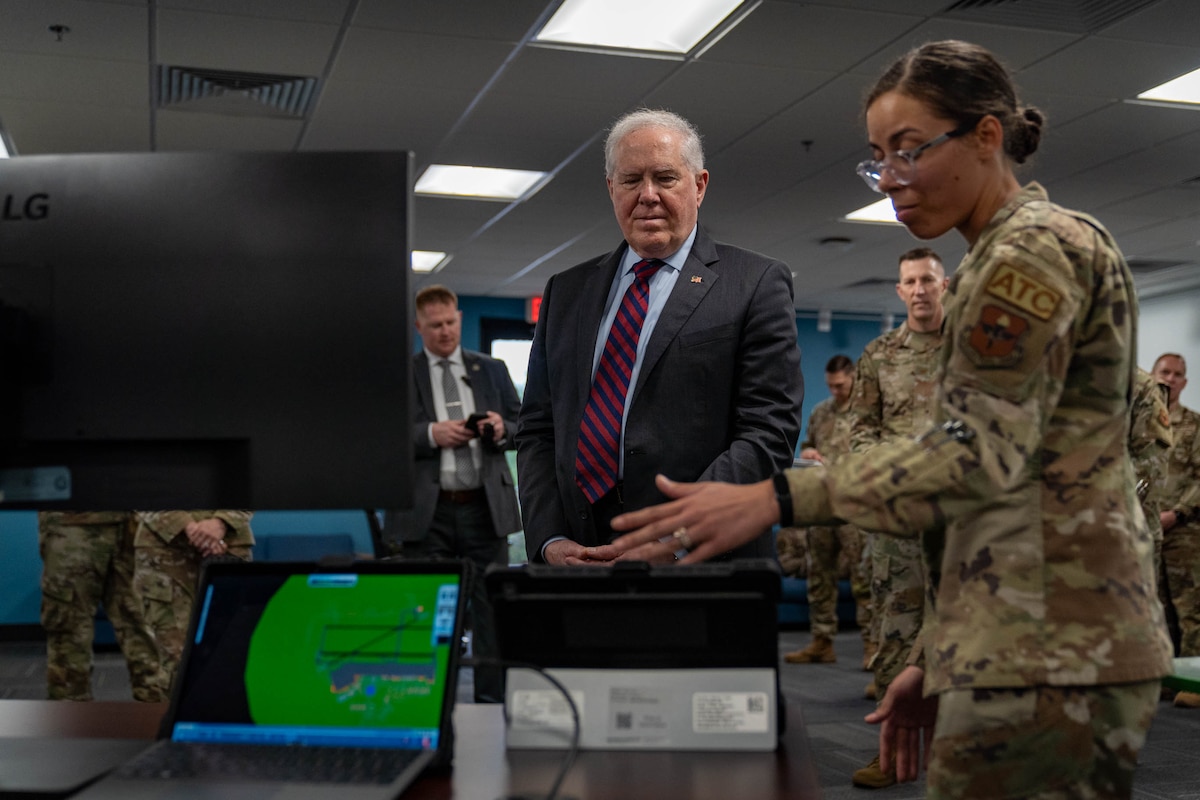 Secretary of the Air Force Frank Kendall is briefed by U.S. Air Force Staff. Sgt. Britney Diamond, 334th Training Squadron instructor, on the capabilities of the 334th TRS air traffic control study room at Keesler Air Force Base, Mississippi, May 3, 2024.
