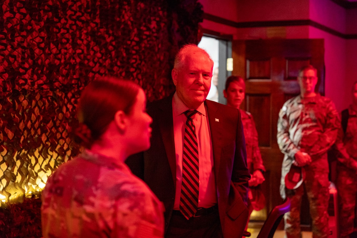 Secretary of the Air Force Frank Kendall listens to a brief from U.S. Air Force 1st Lt. Mikayla Strickland, 333rd Training Squadron instructor, in the 333rd TRS’s escape room at Keesler Air Force Base, Mississippi, May 3, 2024.