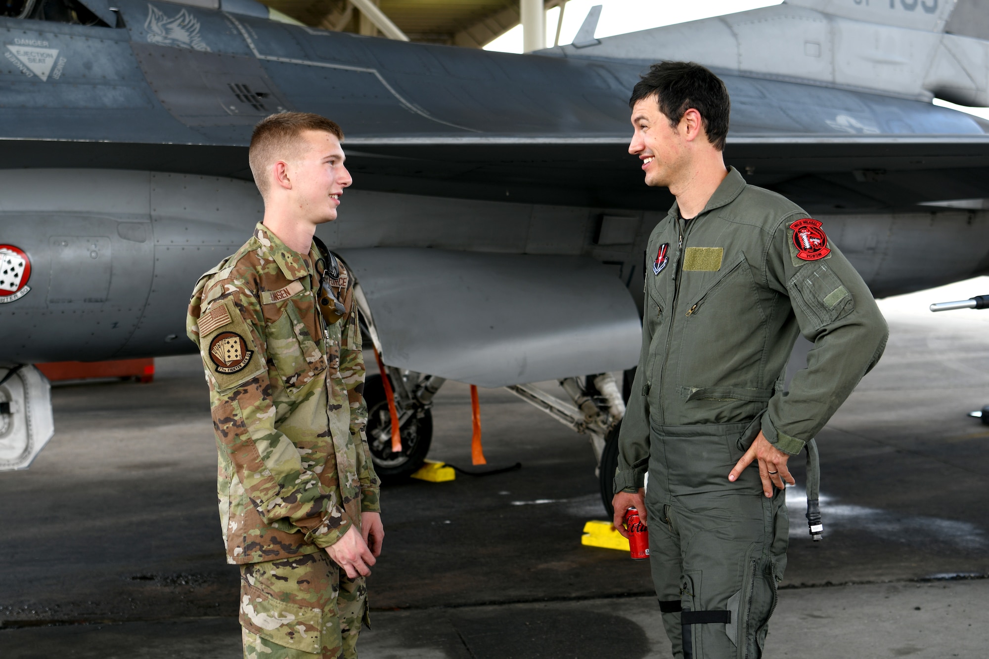 NASCAR driver Joey Logano, right, speaks with Airman 1st Class Dallas Hansen, 77th Fighter Generation Squadron crew chief, who was in charge of the F-16 Fighting Falcon Logano flew in at Shaw Air Force Base, S.C., May 7, 2024. Shaw AFB is dedicated to maintaining a culture and environment of excellence in which everyone can reach their full potential. (U.S. Air Force photo by Staff Sgt. Kelsey Owen)