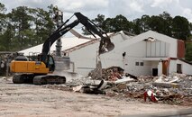 Excavators demolish a section of the old Fort Stewart, Georgia, elementary school