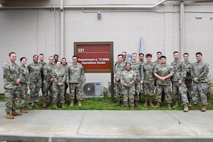 U.S. Space Force Chief of Space Operations Gen. Chance Saltzman, left of sign, stands for a group photo with Guardians assigned to 73rd Intelligence, Surveillance and Reconnaissance Squadron, Detachment 2, during a visit to Osan Air Base, Republic of Korea, May 6, 2024.