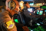 Col. William Gutermuth, left, 433rd Airlift Wing commander, and Lt. Col. Christopher Jones, right, 356th Airlift Squadron commander prepare a 433rd AW C-5M Super Galaxy for takeoff at Dover Air Force Base, Delaware Apr. 20, 2024. The final leg of the mission to move 100,000 pounds of cargo was a flight from Dover to Joint Base San Antonio-Lackland, Texas, the home station of the commanders and the aircrew and completed Gutermuth’s final military flight before retirement.  (U.S. Air Force photo by Tech. Sgt. Jacob Lewis)