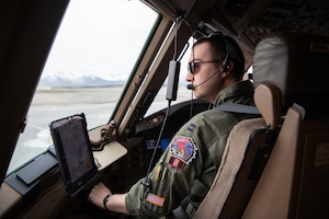 U.S Air Force Capt. Stefan Vetters, an instructor pilot with the 349th Air Refueling Squadron, McConnell Air Force Base, Kansas, prepares for takeoff in a KC-46A Pegasus at Joint Base Elmendorf-Richardson, Alaska, during RED FLAG-Alaska 2401, May 2, 2024. RED FLAG-Alaska provides unique opportunities to integrate various U.S. and allied forces into joint, coalition and multilateral training from simulated forward operating bases. (U.S. Air Force Photo by Airman Raina Dale)
