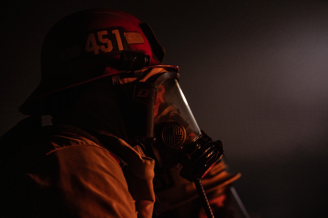 Capt. James Carroll, a Yucca Valley, California native, A-shift captain with The Combat Center Fire Department, Marine Corps Air-Ground Combat Center, assesses a controlled fire during routine training at MCAGCC, Twentynine Palms, California, April 22, 2024. The Combat Center Fire Department’s mission is to improve the quality of life at the MCAGCC by providing high quality emergency fire and rescue services, and a fire prevention program.  (U.S. Marine Corps photo by Cpl. Hunter Wagner)