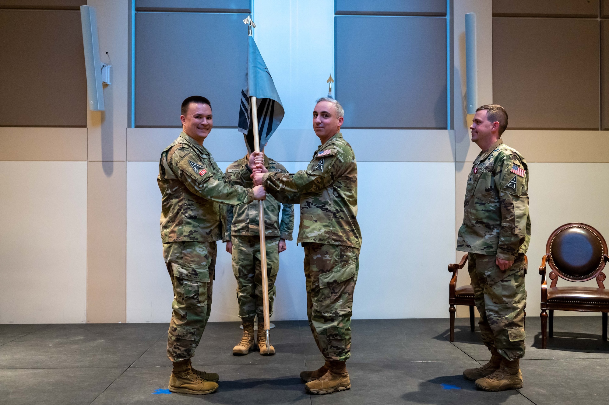 MEN HOLDING FLAG