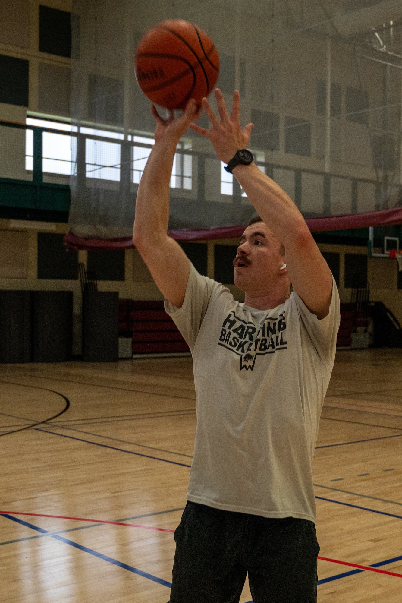 A U.S. Air Force Airman shoots a basketball in the Losano Fitness Center at Laughlin Air Force Base, Texas, April 25, 2024. Intramural sports are an excellent option for Airmen fitness, offering fun and competition while burning calories. (U.S. Air Force photo by Staff Sgt. Nicholas Larsen)