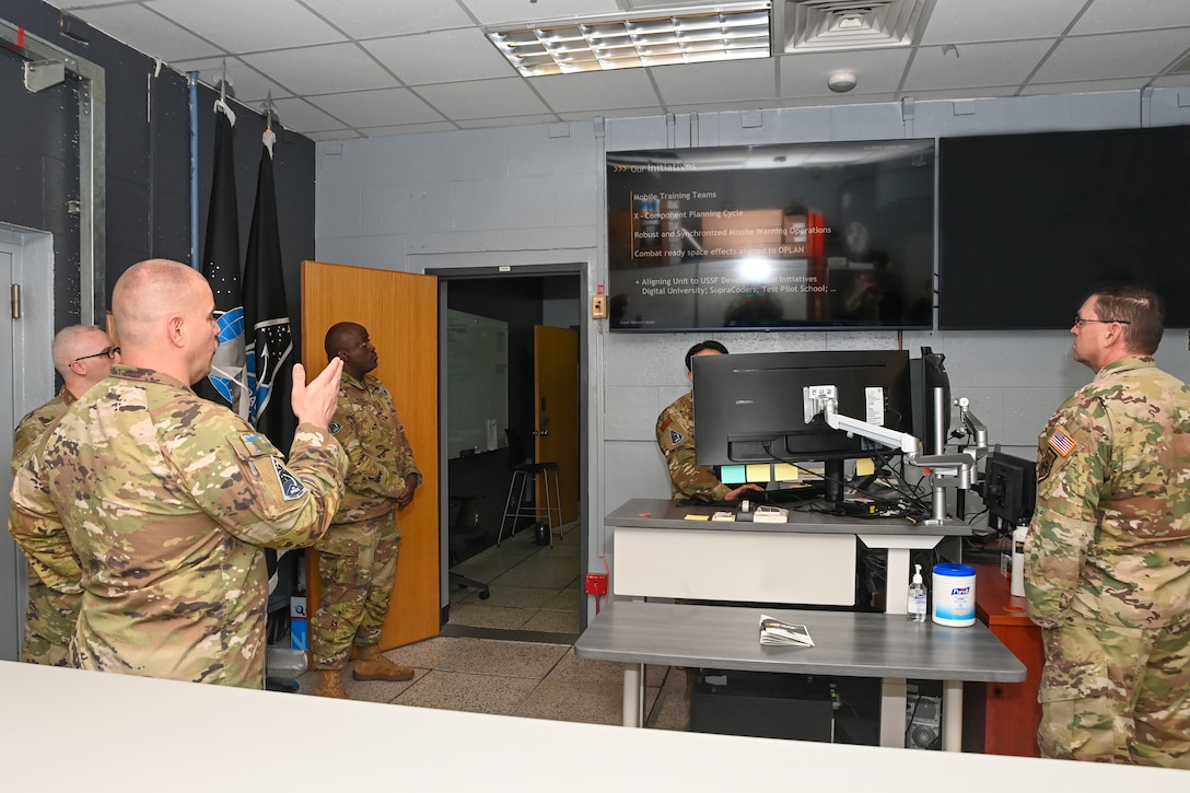 U.S. Space Force Chief of Space Operations Gen. Chance Saltzman, right, listens to a briefing from U.S. Space Force Lt. Col. Joshua McCullion, U.S. Space Forces – Korea commander, left, during a visit to Osan Air Base, Republic of Korea, May 6, 2024.