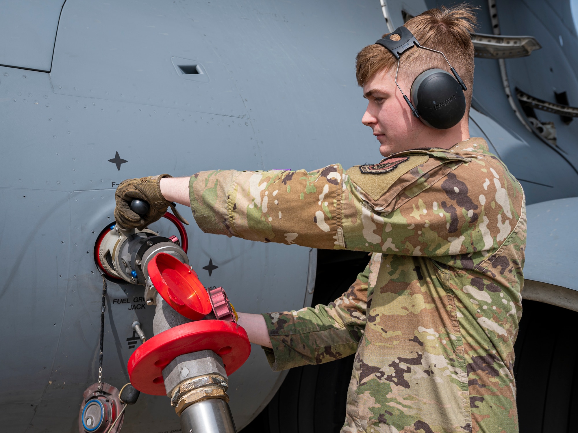 U.S Air Force Senior Airman Adam Goebel, 51st Logistics Readiness Squadron distribution operator, removes fuel from a U.S. Air Force C-17 Globemaster III at Osan Air Base, Republic of Korea, April 19, 2024. The 51st LRS conducted the first-ever wet-wing defuel operation at Osan AB. The operation allows the 51st Fighter Wing to ‘fight tonight’ by preparing for contingencies that require personnel to get fuel to aircraft. (U.S. Air Force photo by Senior Airman Sabrina Fuller-Judd)
