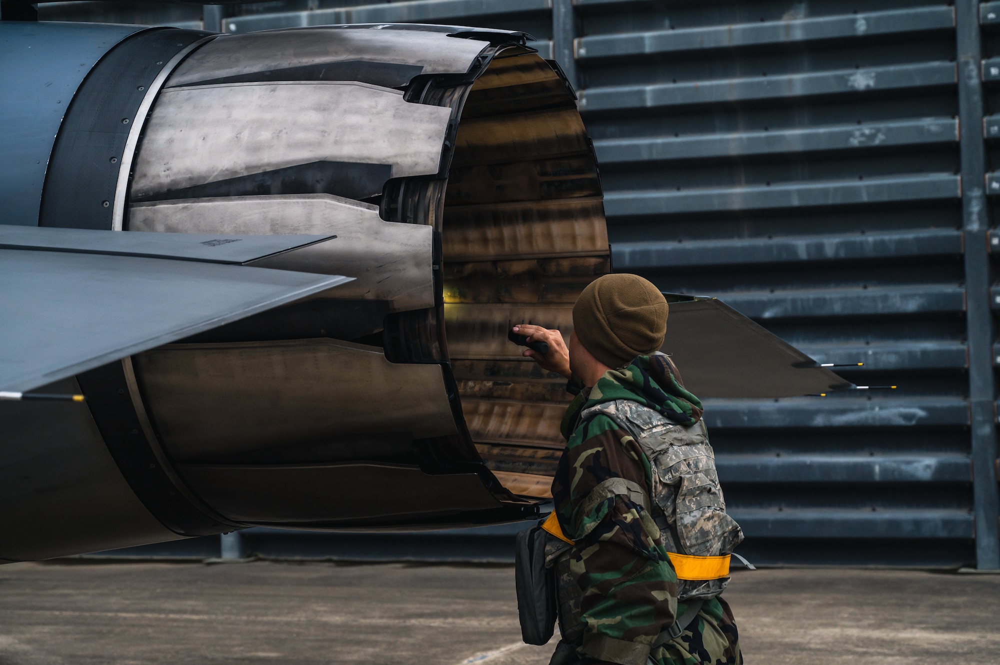 Staff Sgt. Tristan Callum performs a visual inspection of an F-16 Fighting Falcon.