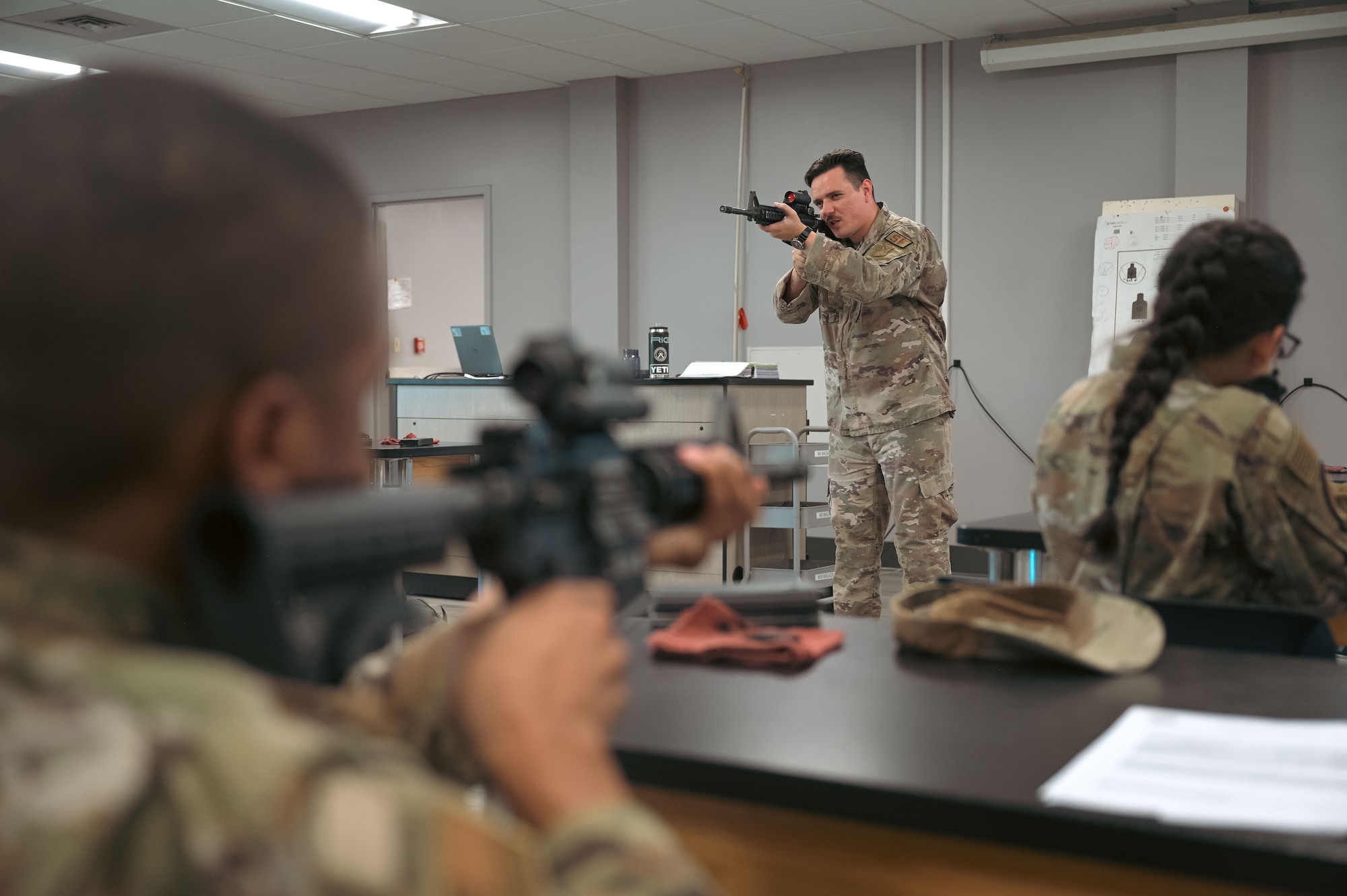 Instructor teaching Airmen.