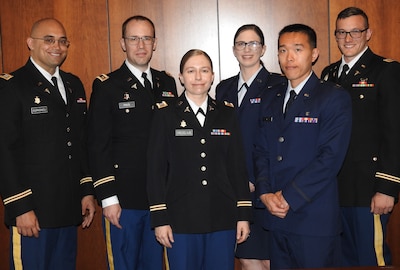 Competitors in the 2024 Research and Innovation Month poster competition at Walter Reed, held May 1-2, included Army Capt. (Dr.) Robert Sgrignoli, Army Maj. (Dr.) Andrew Price, Army Capt. (Dr.) Elena Crecelius, Air Force Maj. (Dr.) Karin Brockman, Air Force Capt. (Dr.) Peter Li and Army Capt. (Dr.) Joshua Pollock, whose investigative work look to enhance the delivery of patient care.