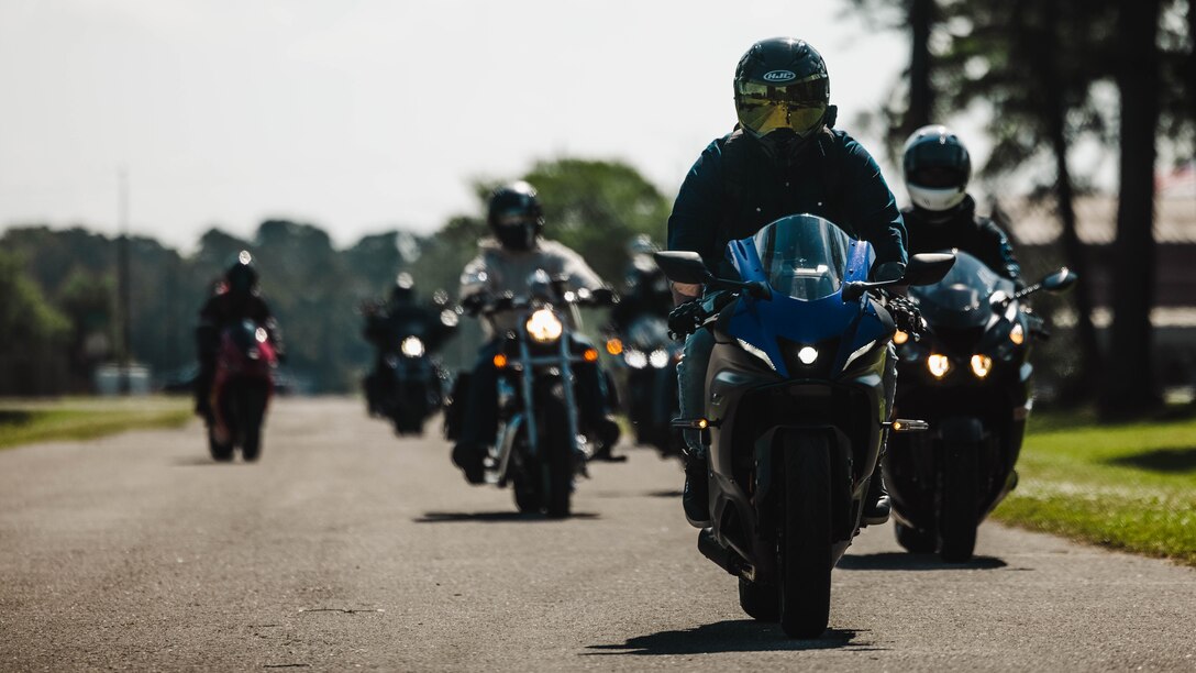 U.S. Marines, Sailors and civilians across II Marine Expeditionary Force take part in the 2d Marine Division (MARDIV) poker run on Camp Lejeune, North Carolina, May 2, 2024. 2d MARDIV conducted a group ride to promote safe riding, camaraderie, and mentorship through a series of physical and mental skills stations across Marine Corps Base Camp Lejeune and Marine Corps Air Station New River to raise awareness for the upcoming motorcycle riding season. (U.S. Marine Corps Photo by Pfc. Micah Thompson)