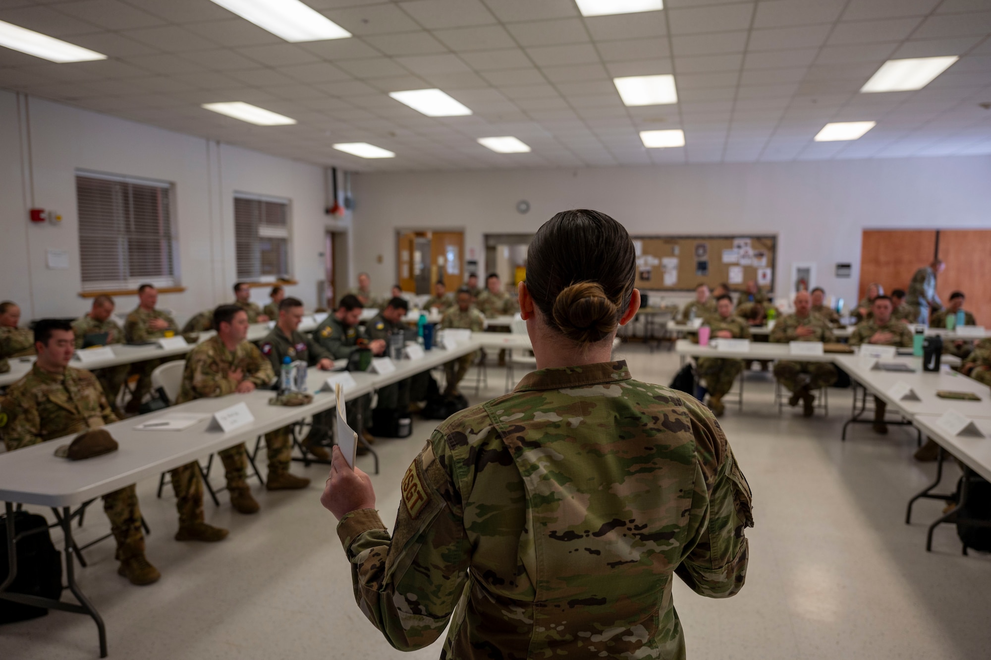 U.S. Air Force Master Sgt. Jamie Caruso-Cortez, 49th Communications Squadron first sergeant, gives a speech during the First Sergeant Symposium, at Holloman Air Force Base, New Mexico, Apr. 29, 2024. Diamond-wearing first sergeants actively engage with attendees throughout the symposium to educate, support and share personal experiences and provide resources to those potentially interested in adding a diamond to their rank insignia. (U.S. Air Force photo by Airman 1st Class Michelle Ferrari)