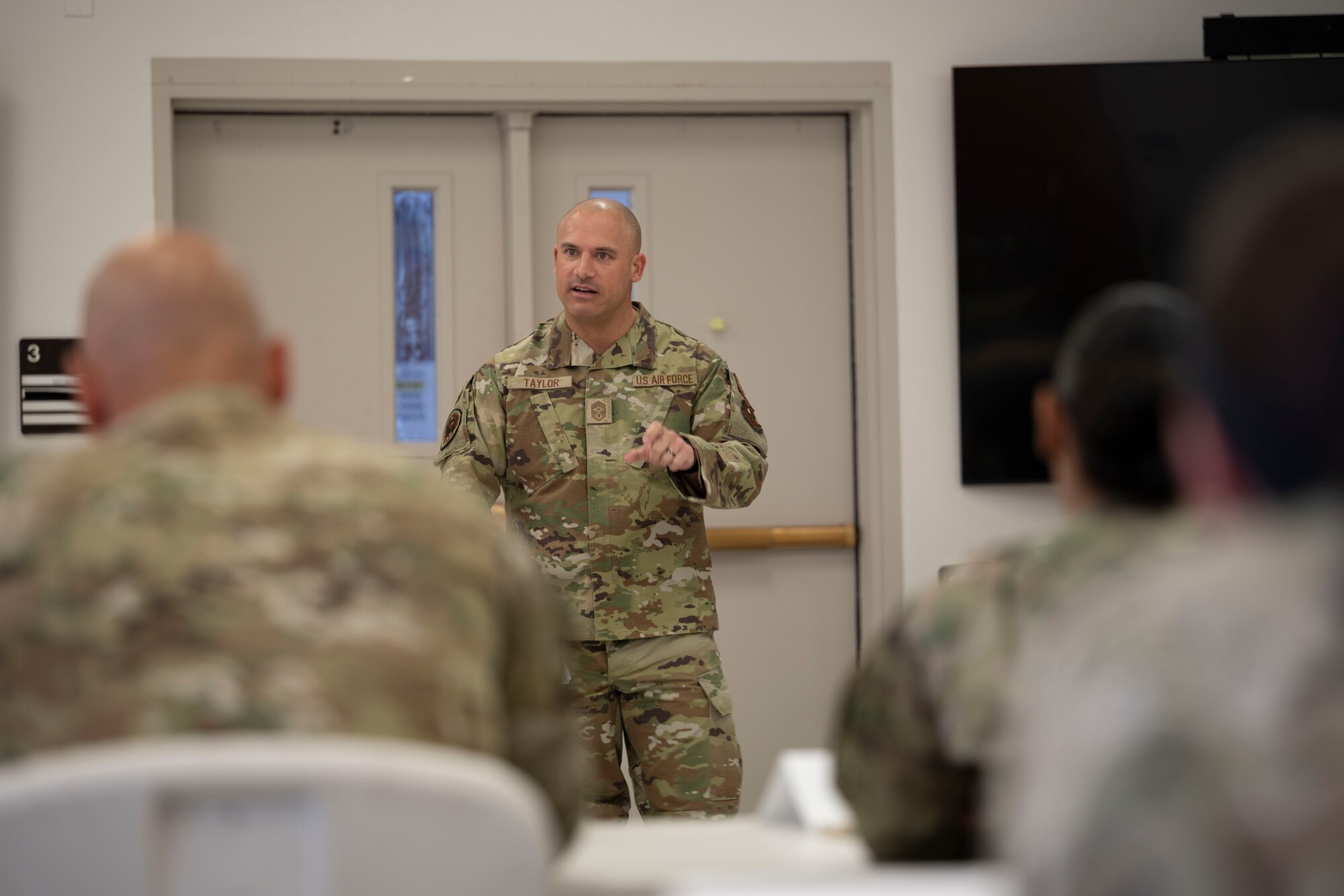 U.S. Air Force Chief Master Sgt. Ryan Taylor, Air Education Training Command first sergeant provides input during the First Sergeant Symposium at Holloman Air Force Base, New Mexico, May 1, 2024. Diamond-wearing first sergeants actively engage with attendees throughout the symposium to educate, support and share personal experiences and provide resources to those potentially interested in adding a diamond to their rank insignia. (U.S. Air Force photo by Airman 1st Class Michelle Ferrari)