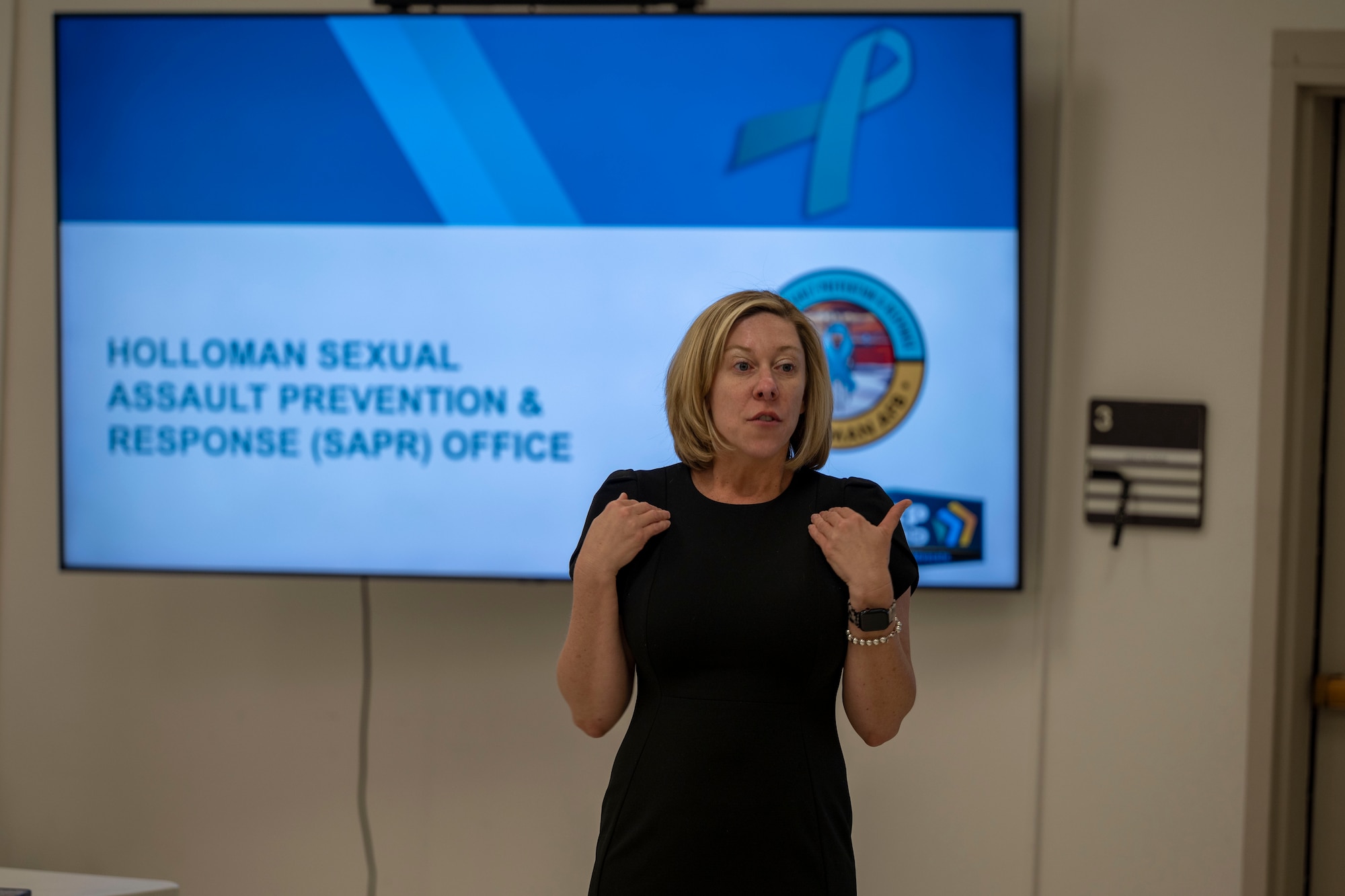 Jamie Austin, 49th Wing Sexual Assault and Prevention Response Program manager, discusses SAPR policy at Holloman Air Force Base, New Mexico, May 2, 2024. During the symposium, participants engage in workshops, panel discussions and networking opportunities designed to foster a culture of continuous learning and improvement. (U.S. Air Force photo by Airman 1st Class Michelle Ferrari)