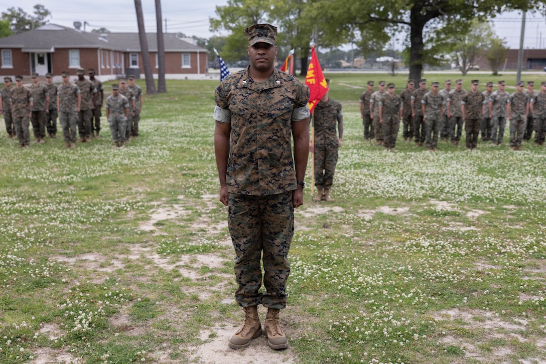 U.S. Marine Corps Capt. Devin Davis, the oncoming company commander of Mobile Reconnaissance Company (MRC), 2d Light Armored Reconnaissance (LAR) Battalion, 2d Marine Division (2d MARDIV), stands at attention during a change of command ceremony on Camp Lejeune, North Carolina, April 17, 2024. Capt. Brandon Klewicki, the outgoing company commander of MRC, 2d LAR, 2d MARDIV, relinquished command to Capt. Devin Davis, the oncoming company commander of MRC, 2d LAR, 2d MARDIV. (U.S. Marine Corps photo by Lance Cpl. Francis Hrosar)