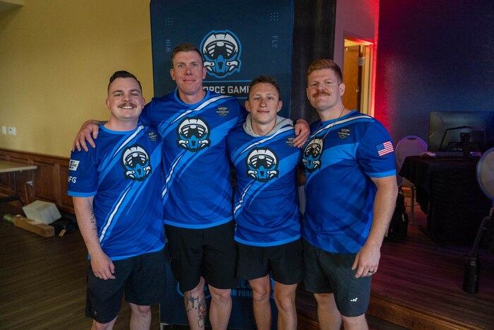 U.S. Air Force Staff Sgt. Corey O'Steen, Tech. Sgt. Michael Daehnert, Airman 1st Class Nicholas Mattina and Staff Sgt. Anthony Ryan, members of the 81st Security Forces Squadron and Keesler's Air Force Base Gaming team, pose before they compete in the Eastern Regional Esports Invitational at Keesler Air Force Base, Mississippi, May 4, 2024.
