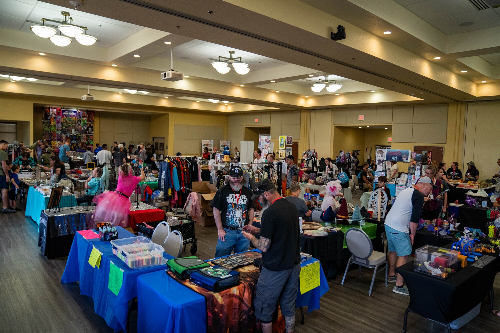 Vendors sell themed products during Keesler Con and the Eastern Regional Esports Invitational at Keesler Air Force Base, Mississippi, May 4, 2024.