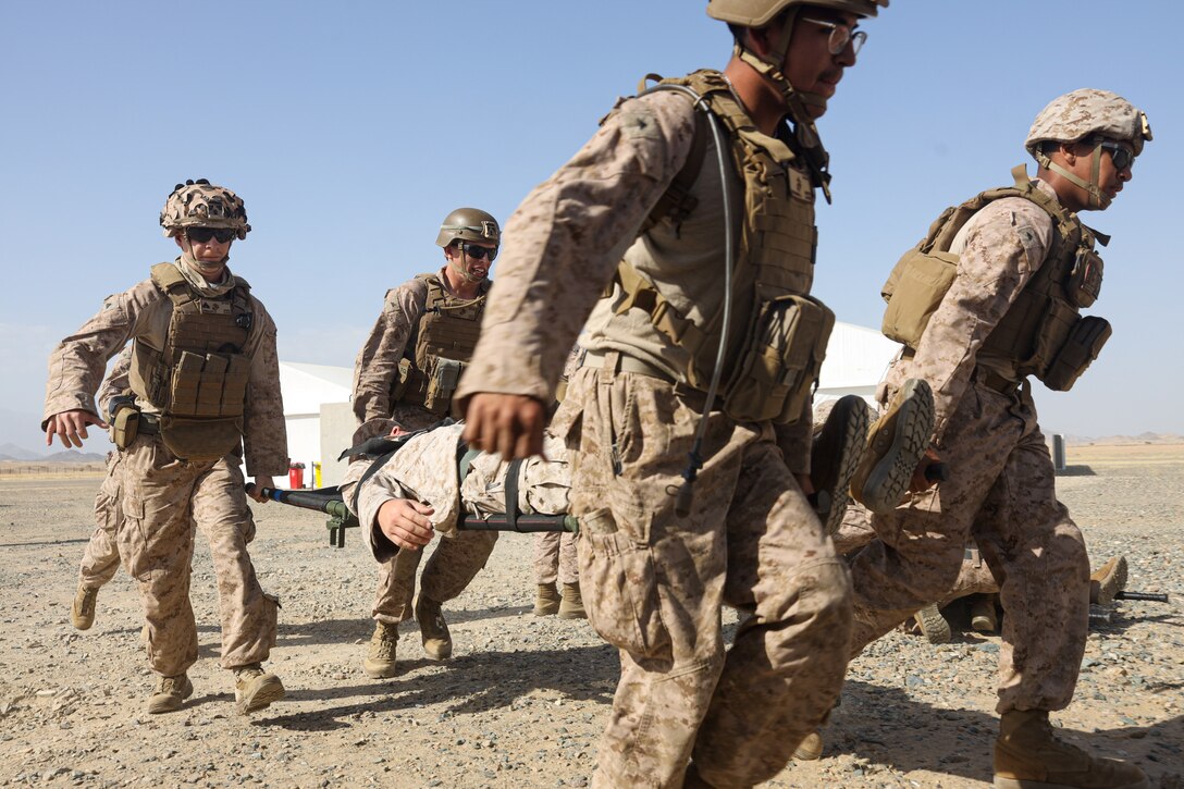 U.S. Marines with 2nd Distribution Support Battalion, Combat Logistics Regiment 2, 2nd Marine Logistics Group, carry a simulated casualty on a liter to a medical tent during a mass casualty exercise in preparation for exercise Native Fury 24 at a Logistics Support Area established in the Kingdom of Saudi Arabia, May 1, 2024. Exercise Native Fury 24 is a key multi-lateral exercise sponsored by U.S. Central Command and executed by U.S. Marine Corps Forces Central Command in collaboration with the Kingdom of Saudi Arabia and the United Arab Emirates. This iteration emphasizes the strategic use of logistics and leverage the extensive network of roads and infrastructure across the Arabian Peninsula. (U.S. Marine Corps photo by 2nd Marine Logistics Group)