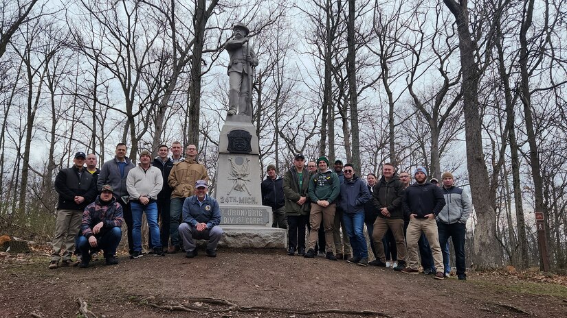 Candidates in the Michigan Army National Guard Officer Candidate School, Class 067, receive lessons in leadership from U.S. Marine Corps Col. (Ret.) Robert Abbott during a staff ride to the Gettysburg National Battlefield Park on March 28, 2024.