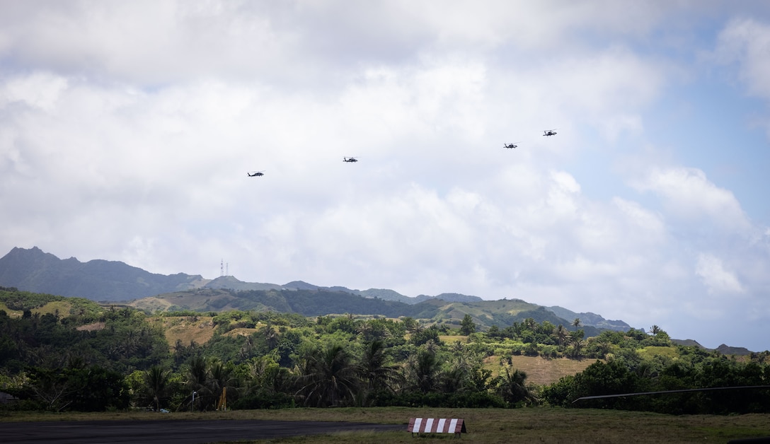 U.S. Army UH-60 Black Hawk helicopters prepare to land at Basco airport to conduct forward arming and refueling point operations during Balikatan 24 in Basco, Batanes Province, Philippines, April 30, 2024. BK 24 is an annual exercise between the Armed Forces of the Philippines and the U.S. military designed to strengthen bilateral interoperability, capabilities, trust, and cooperation built over decades of shared experiences. The Black Hawk helicopters are assigned to the 225th Brigade Support Battalion, 2nd Infantry Brigade Combat Team, 25th Infantry Division. (U.S. Marine Corps photo by Sgt. Jennifer Andrade)