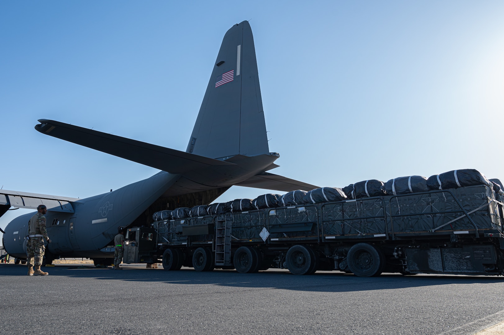 Bundles of humanitarian aid destined for Gaza are loaded onto a U.S. Air Force C-130J Super Hercules at an undisclosed location within the U.S. Central Command area of responsibility, May 9, 2024. The U.S. Air Force’s rapid global mobility capability enables the expedited movement of critical, life-saving supplies to Gaza. (U.S. Air Force photo)