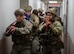 Defenders assigned to the 5th Security Forces Squadron (5th SFS) patrol a building as part of an active shooter drill during Warbird Week at Minot Air Force Base, North Dakota, May 7, 2024. Warbird Week is an exercise that tests the overall capabilities of the 5th Bomb Wing units and how effectively they perform their missions. (U.S. Air Force photo by Airman 1st Class Luis Gomez)
