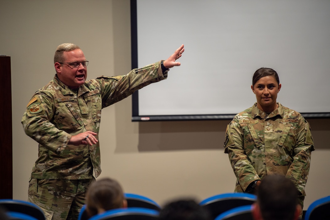 U.S. Air Force Master Sgt. Jason L. White, 75th Fighter Generation Squadron first sergeant, and Master Sgt. Carleen M. Wallace, 23rd Maintenance group first sergeant, conduct a demonstration on how to control negative emotions during the First Sergeant Symposium at Moody Air Force Base, Georgia, May 6, 2024. Every brief held during the symposium is designed to convey the responsibilities and expectations of a first sergeant. (U.S. Air Force photo by Airman 1st Class Iain Stanley)