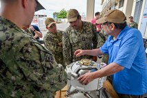 JOINT BASE PEARL HARBOR-HICKAM (March 11, 2024) Sailors stationed on submarines homeported at Joint Base Pearl Harbor-Hickam, Hawaii receive demonstrations and hands-on training of navigation equipment from members of the Naval Information Warfare Center (NIWC) Atlantic in their Mobile Training Lab, March 11, 2024. The Pacific Submarine Force provides strategic deterrence; anti-submarine warfare; anti-surface warfare; precision land strike; intelligence, surveillance, reconnaissance, and early warning; and special warfare capabilities around the globe. (U.S. Navy photo by Chief Mass Communication Specialist Amy Biller)