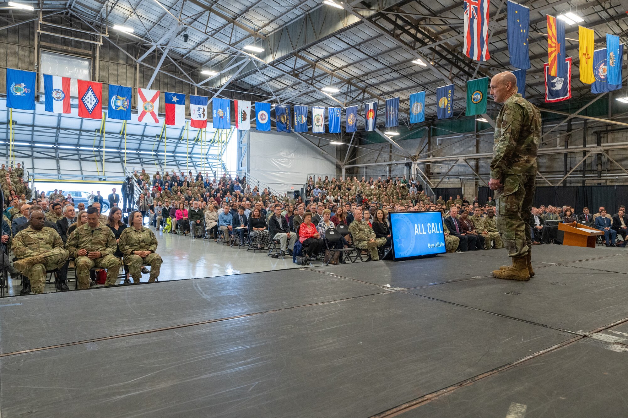 Image of USAF general on stage. 