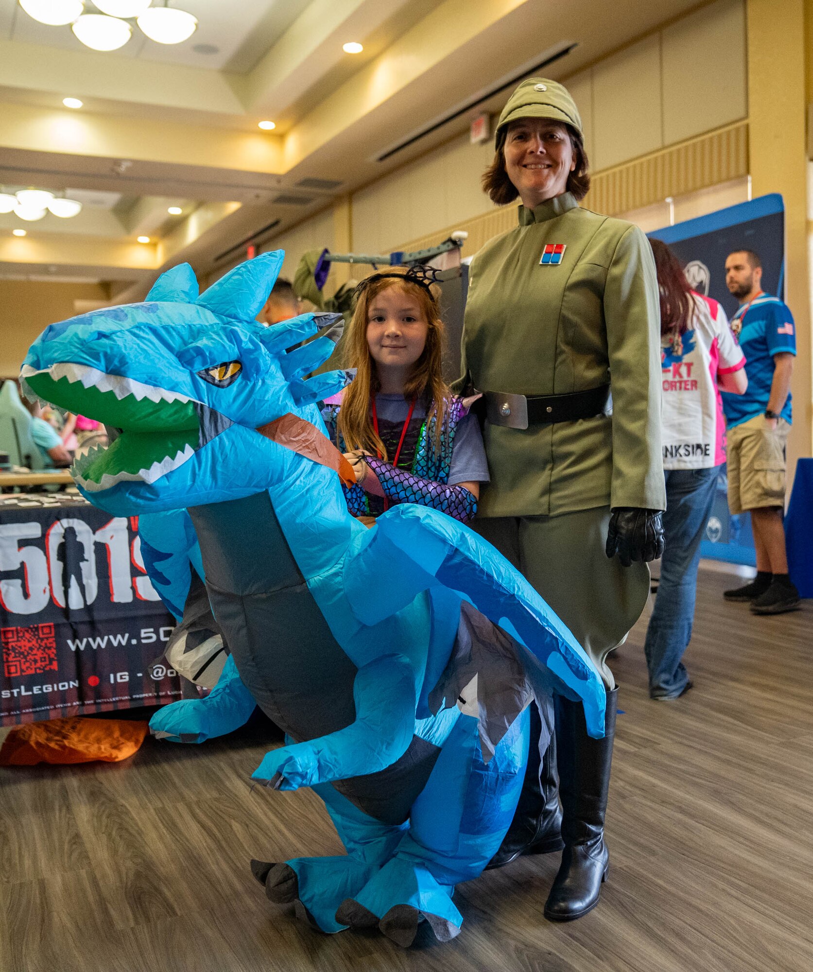 U.S. Air Force Lt. Col. Jennifer Weller, 336th Training Squadron commander, poses with her daughter during Keesler Con and the Eastern Regional Esports Invitational at Keesler Air Force Base, Mississippi, May 4, 2024.