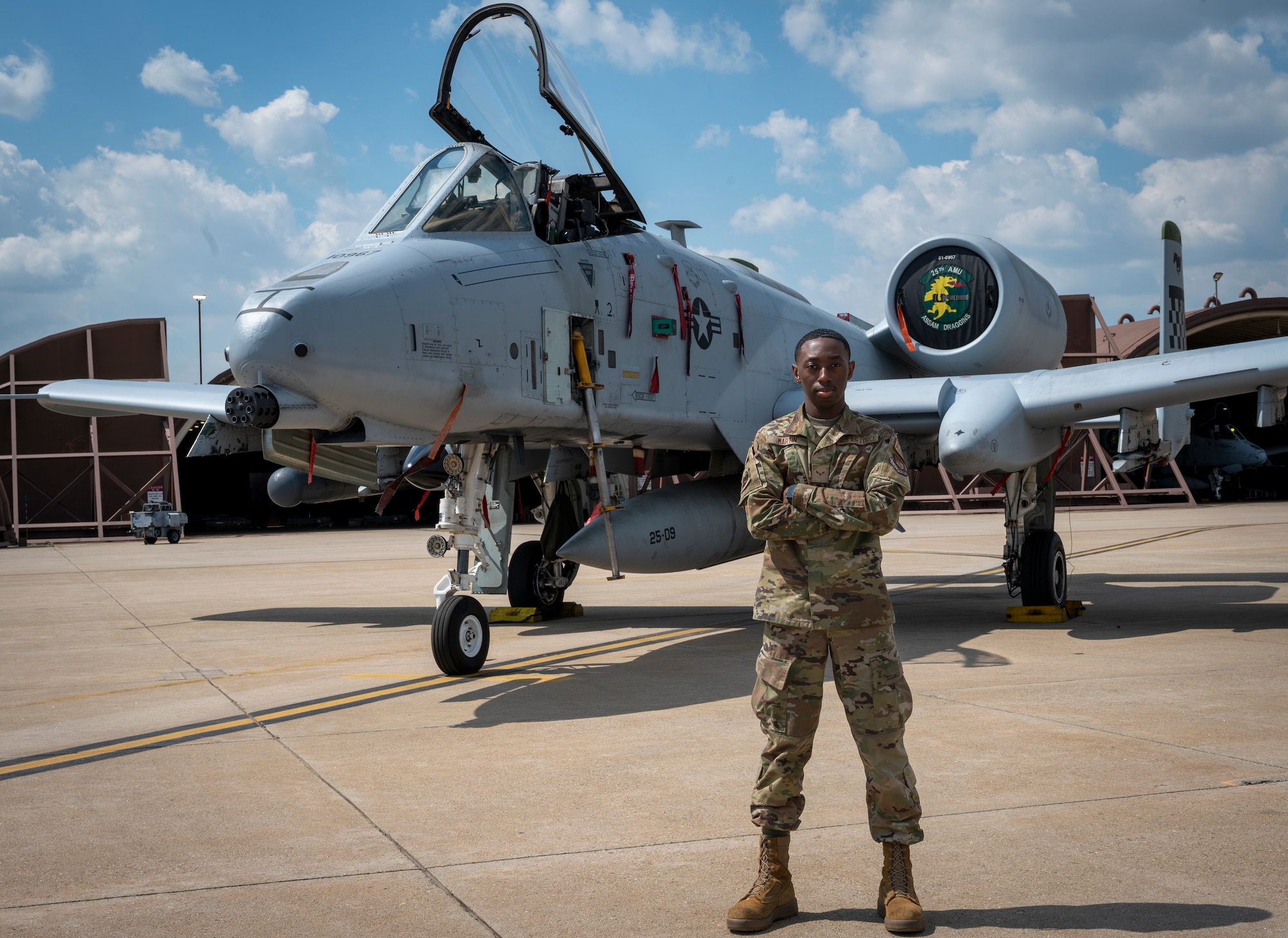 U.S. Air Force Airman 1st Class D’andrea Martin, 25th Fighter Squadron aviation resource manager, poses for a portrait at Osan Air Base, Republic of Korea, April 19, 2024. Martin is the first member of his family to join the U.S. Air Force, he enlisted in the military to pursue education benefits and meet new people. His efforts in pursuing personal and professional goals, exemplify the “Fight Tonight” mindset by developing himself and others as future leaders. (U.S. Air Force photo by Senior Airman Sabrina Fuller-Judd)