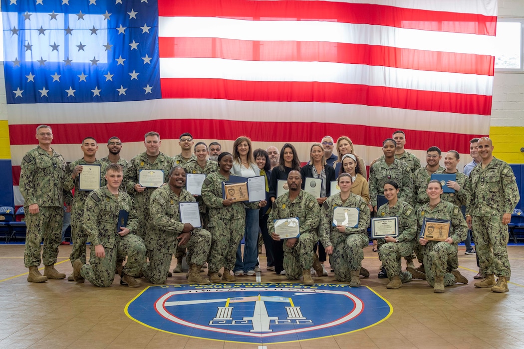 Personnel assigned to Naval Support Activity Souda Bay, Greece, receive awards and recognitions from Capt. Odin J. Klug, commanding officer, NSA Souda Bay, during an awards ceremony on May 9, 2024.