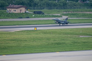 A U.S. Air Force F-16 Fighting Falcon assigned to the 36th Fighter Squadron lands on a runway at Osan Air Base, Republic of Korea, May 8, 2024. The 36th FS aircraft returned from the Red Flag-Alaska 24-1 training event with sustained operational capabilities and improved interoperability with allies. (U.S. Air Force Photo by Senior Airman Kaitlin Frazier)