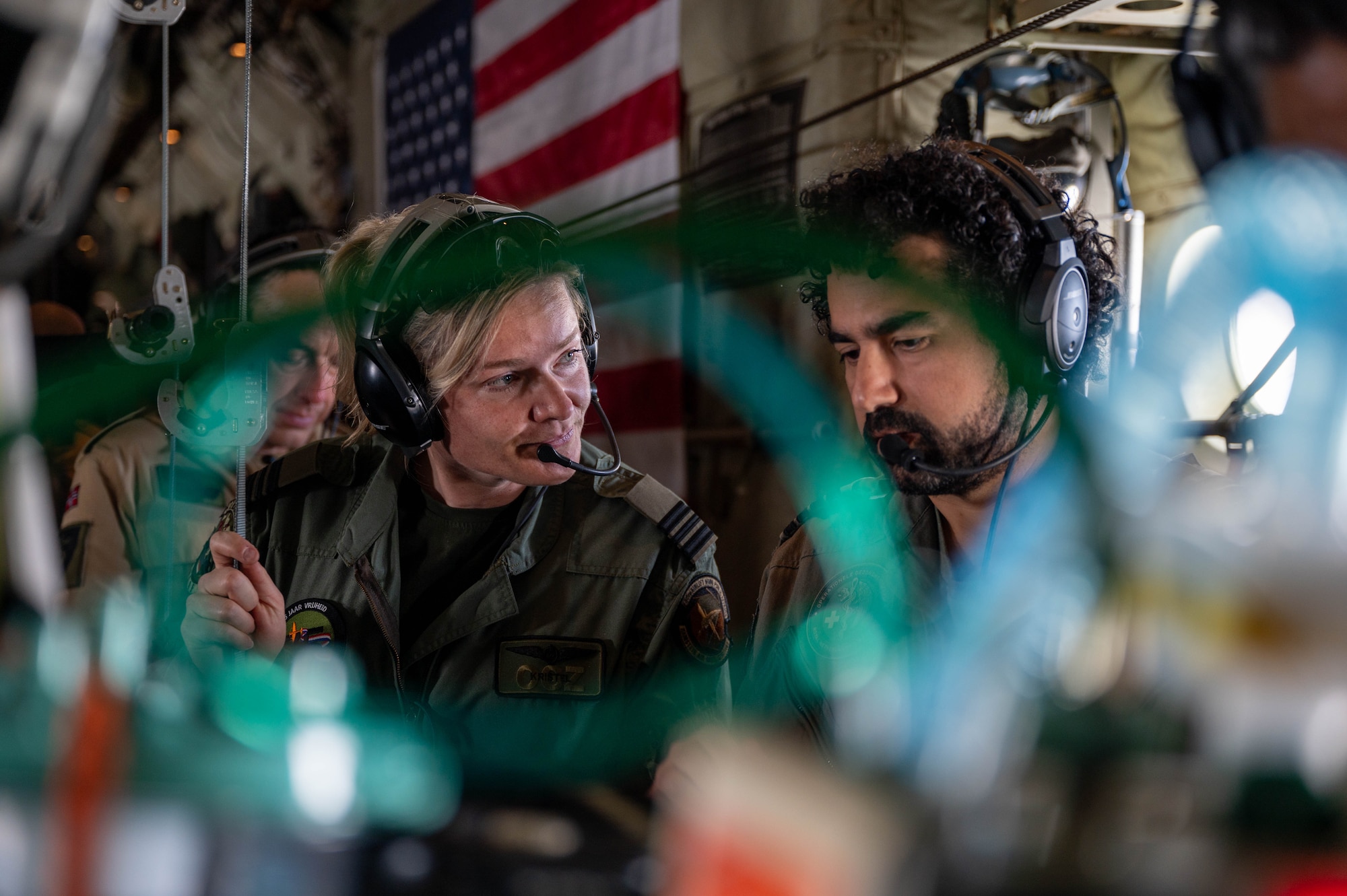 Royal Netherlands Air Force team members explore U.S.A.F. Critical Care Air Transport equipment during a flight from Papa Air Base, Hungary, to Ramstein AB, Germany, May 7, 2024.