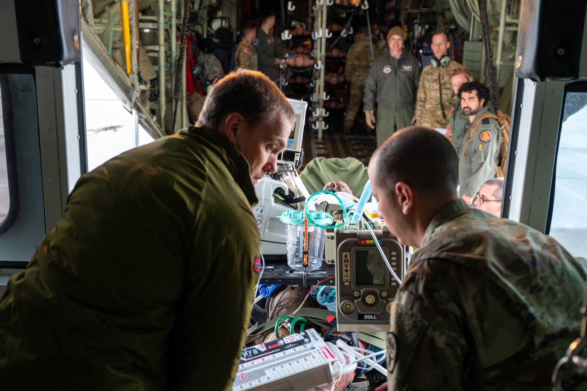 U.S. Air Force, U.S. Army, Royal Norwegian AF and Royal Netherlands AF off-load medical manikin patients from a C-130J Super Hercules at Ramstein Air Base, Germany, May 7, 2024.