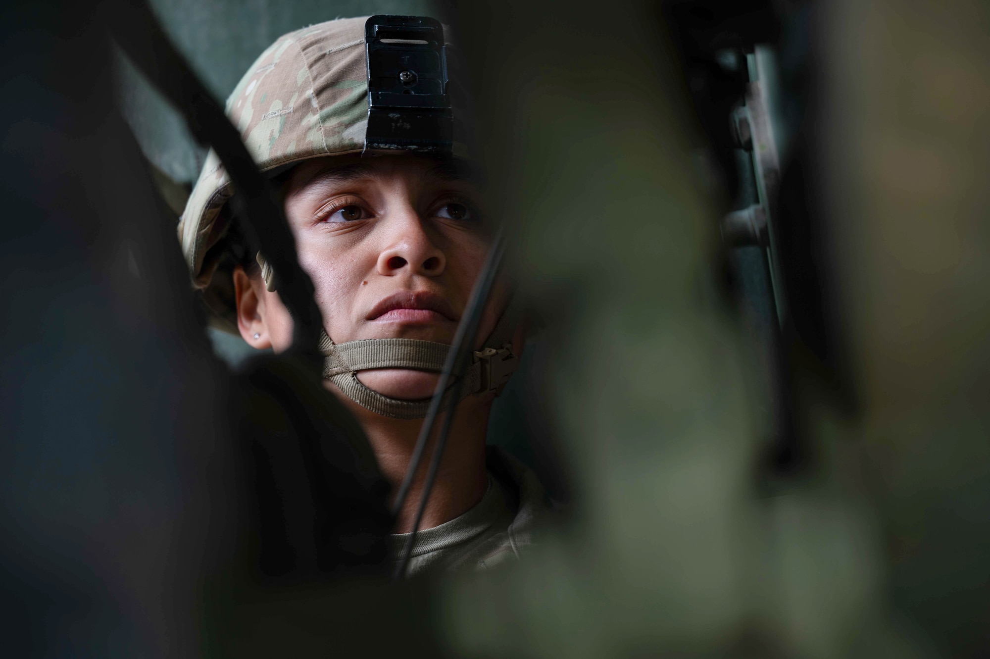 U.S. Army Sgt. Erica Nieto, a High Mobility Artillery Rocket System (HIMARS) gunner assigned to the 4th Battalion,133rd Field Artillery Regiment, Texas Army National Guard trains on the proper procedures for loading and lifting the M142 HIMARS on a Tunisian C-130J Super Hercules aircraft at Ramstein Air Base, Germany, May 4, 2024.