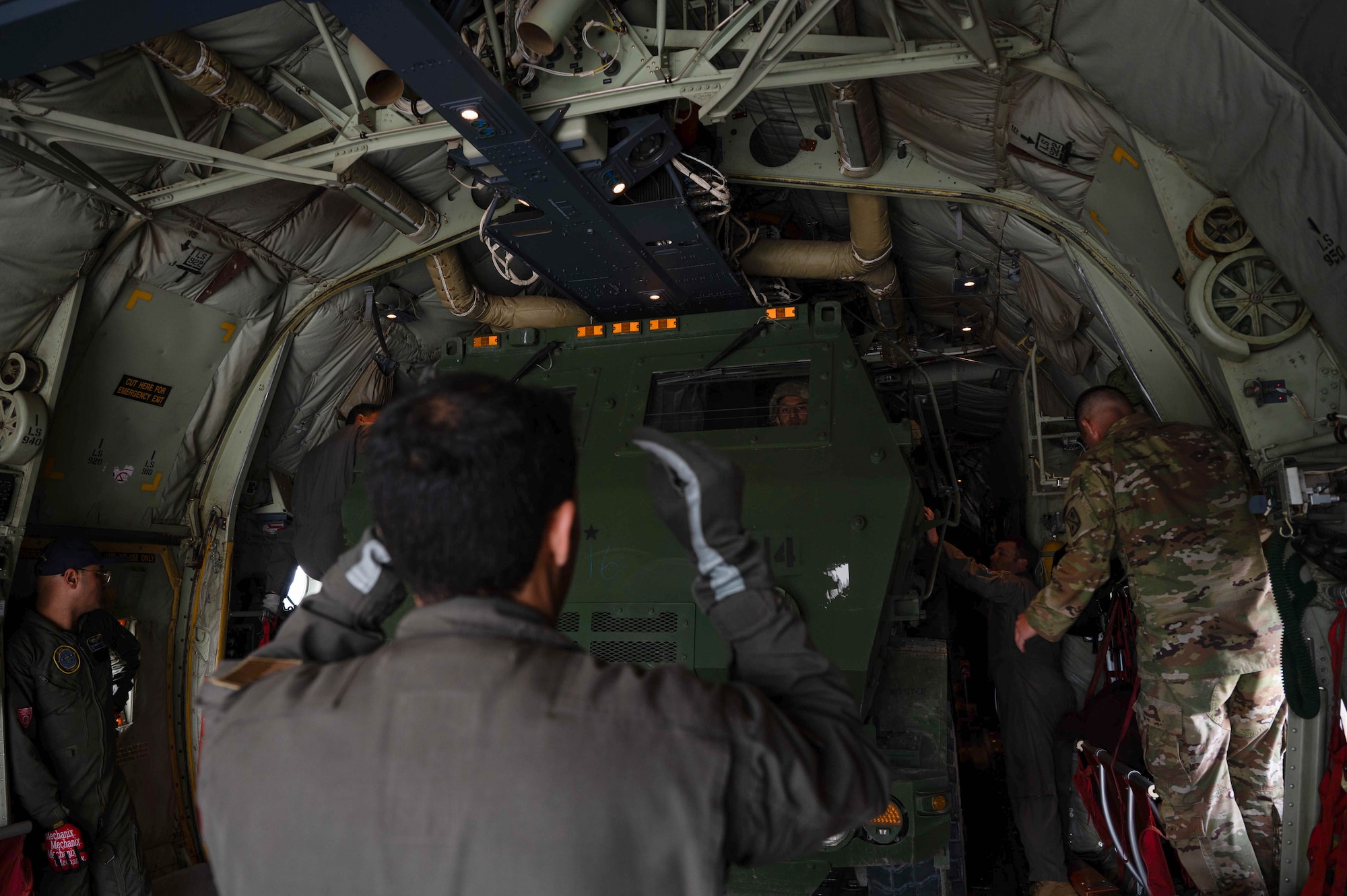 Tunisian Air Force and U.S. Air Force loadmasters guided a M142 High Mobility Artillery Rocket System on a Tunisian C-130J Super Hercules aircraft at Ramstein Air Base, Germany, May 4, 2024.