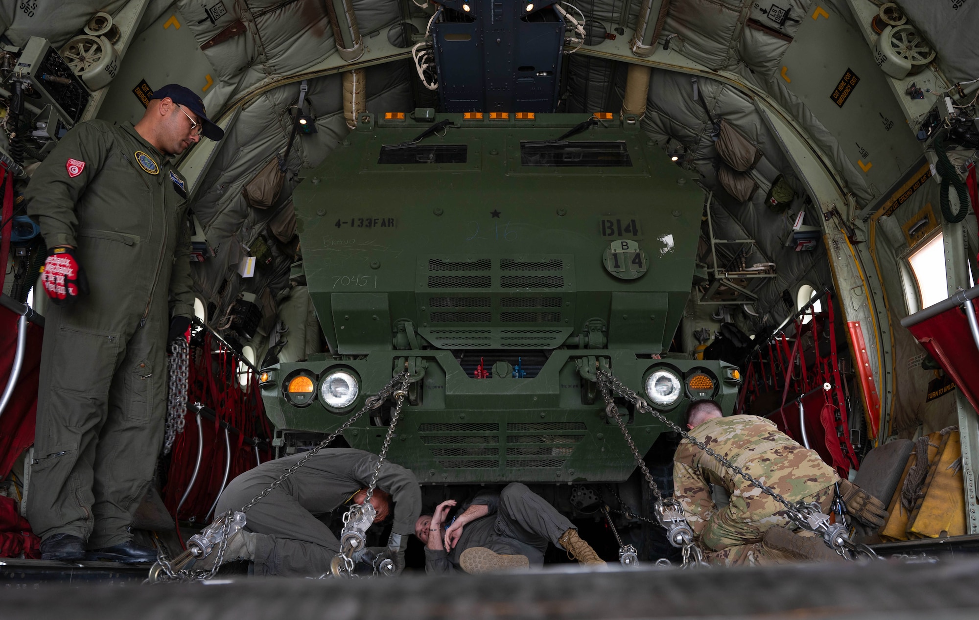 Tunisian Air Force and U.S. Air Force loadmasters secure a M142 High Mobility Artillery Rocket System onto a Tunisian C-130J Super Hercules aircraft at Ramstein Air Base, Germany, May 4, 2024.