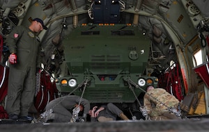 Tunisian Air Force and U.S. Air Force loadmasters secure a M142 High Mobility Artillery Rocket System onto a Tunisian C-130J Super Hercules aircraft at Ramstein Air Base, Germany, May 4, 2024.