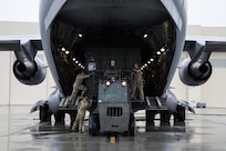 Alaska Air National Guardsmen from the 176th Wing load equipment onto a C-17 Globemaster III in support of Kodiak Arctic Care 24 Innovative Readiness Training Mission at Joint Base Elmendorf-Richardson, Alaska, May 6, 2024.