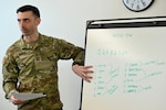 U.S. Army Capt. Jesse Searls, AGR Program Manager/OCS Commander, District of Columbia National Guard, gives a presentation during the Common Faculty Development-Instructor Course (CFD-IC) at the D.C. National Guard’s 260th Regiment Regional Training Institute (RTI) at Fort Belvoir, Va., March 15, 2024. The course teaches new instructors, trainers, and facilitators how to build lesson plans and effectively reach their intended audience. (U.S. Air National Guard photo by Master Sgt. Arthur M. Wright)