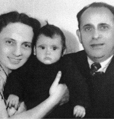 A monochrome photo of Connie Liss (center) her father (right), and her mother (left) when Liss was a baby. Liss recently spoke to members of the Strategic Systems Programs (SSP) workforce about her mother's experiences as a Holocaust survivor who was held for three years at Auschwitz. Her presentation was part of SSP's Special Emphases Programs, which are employee-engagement programs ithat illuminate underrepresented groups and topics in an effort to highlight diversity within the workforce.