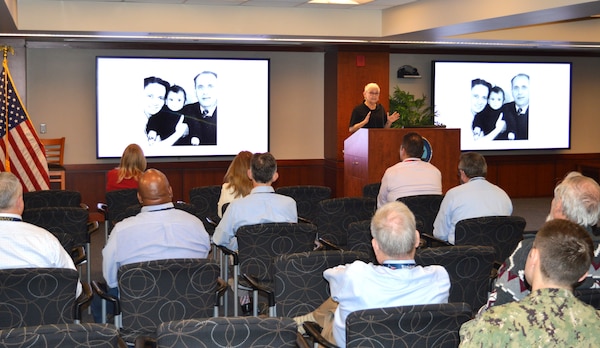 Connie Liss speaks to members of the Strategic Systems Programs (SSP) workforce about her mother's experiences as a Holocaust survivor who was held for three years at Auschwitz. Her presentation was part of SSP's Special Emphasis Programs' recognition of Holocaust Day of Remembrance. The special emphasis programs are employee-engagement programs that illuminate underrepresented groups and topics in an effort to highlight diversity within the workforce.