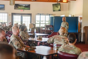 Chief Master Sgt. Israel Nuñez, Senior Enlisted Advisor to the Chief of Air Force Reserve and Command Chief Master Sgt. of Air Force Reserve Command speaks to senior enlisted non-commissioned officers on MacDill Air Force Base, Florida, May 4, 2024. Nuñez visited the 927th Air Refueling Wing Airmen during the unit training assembly and focused on addressing concerns and taking feedback. (U.S. Air Force photo by Staff Sgt. Alexis Suarez)