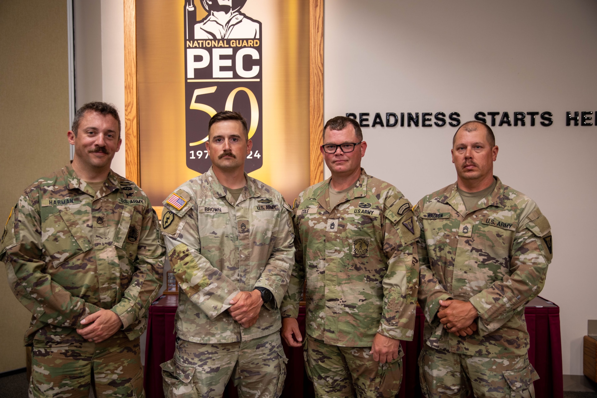 U.S. Army Staff Sgt. Adam Brown receives the Chief's 50 badge for marksmanship excellence during the Winston P. Wilson Championship hosted by the National Guard Marksmanship Training Center in Camp Robinson, Arkansas, from April 27-May 3, 2024. The WPW competition showcases the adaptiveness, resilience, and lethality of our forces, affirming the readiness of National Guard citizen-Soldiers to meet the nation’s challenges. (U.S. Army National Guard photo by Sgt. Destini Keene)