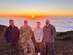 Members of the Mount Official Scheduling System team pose atop the 10,023-foot summit of Haleakalā in Hawaii. In just under six months, the MOSS team created and deployed a web-based application that provides the warfighter with 15-20% more Space Domain Awareness data. (Courtesy photo provided by U.S. Air Force Maj. Matthew Holland)